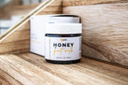 Honey goat milk face and eye cream jar displayed upright with minimalist label and soft neutral background