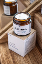 Leafia Skincare Retinol + Ceramides face cream open jar on wood, smooth white cream in lightweight barrier-supporting moisturizer