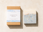 Soap packaging with 'Confetti Hills' branding on a beige background