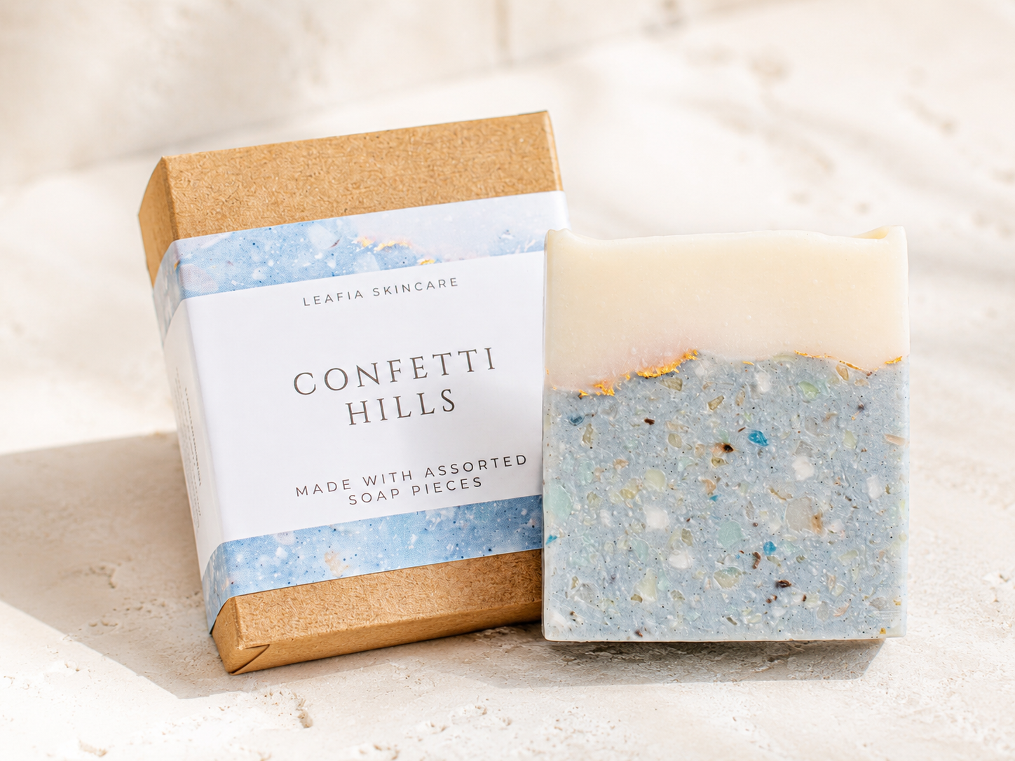 Bar of soap with packaging labeled 'Confetti Hills' on a light background