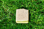 Bar of soap on a grassy surface