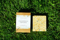 Product of soap on green grass