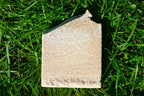 Pink salt soap on green grass