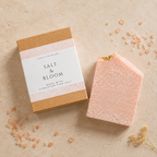 Bar of soap with 'Salt & Bloom' packaging on a beige surface