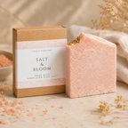 Pink salt bar with 'Salt & Bloom' packaging on a neutral background