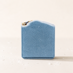 Blue textured bar of soap on a light background