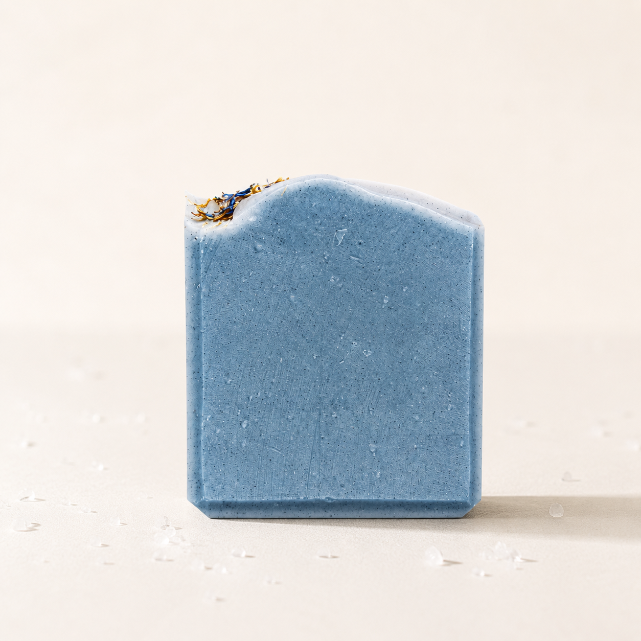 Blue textured bar of soap on a light background